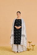 Rich cotton-printed designer suits paired with elegant chiffon dupatta.